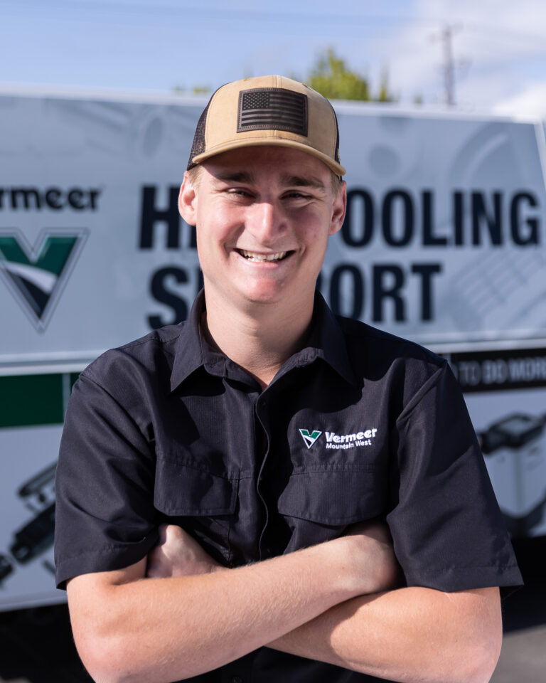 Bo Schwenckert, Vermeer Borestore Specialist, standing in front of a Vermeer parts truck.