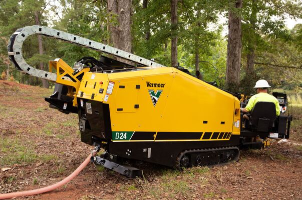 Vermeer D24 horizontal directional drill boring in a wooded setting